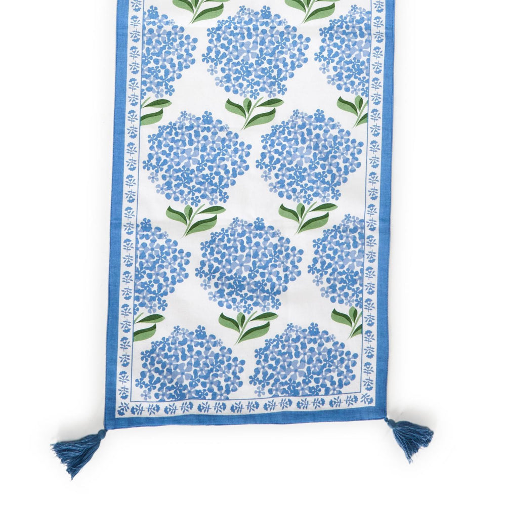 Two's Company Decorative Hydrangea Print Cotton Table Runner Featuring Tassel Accents